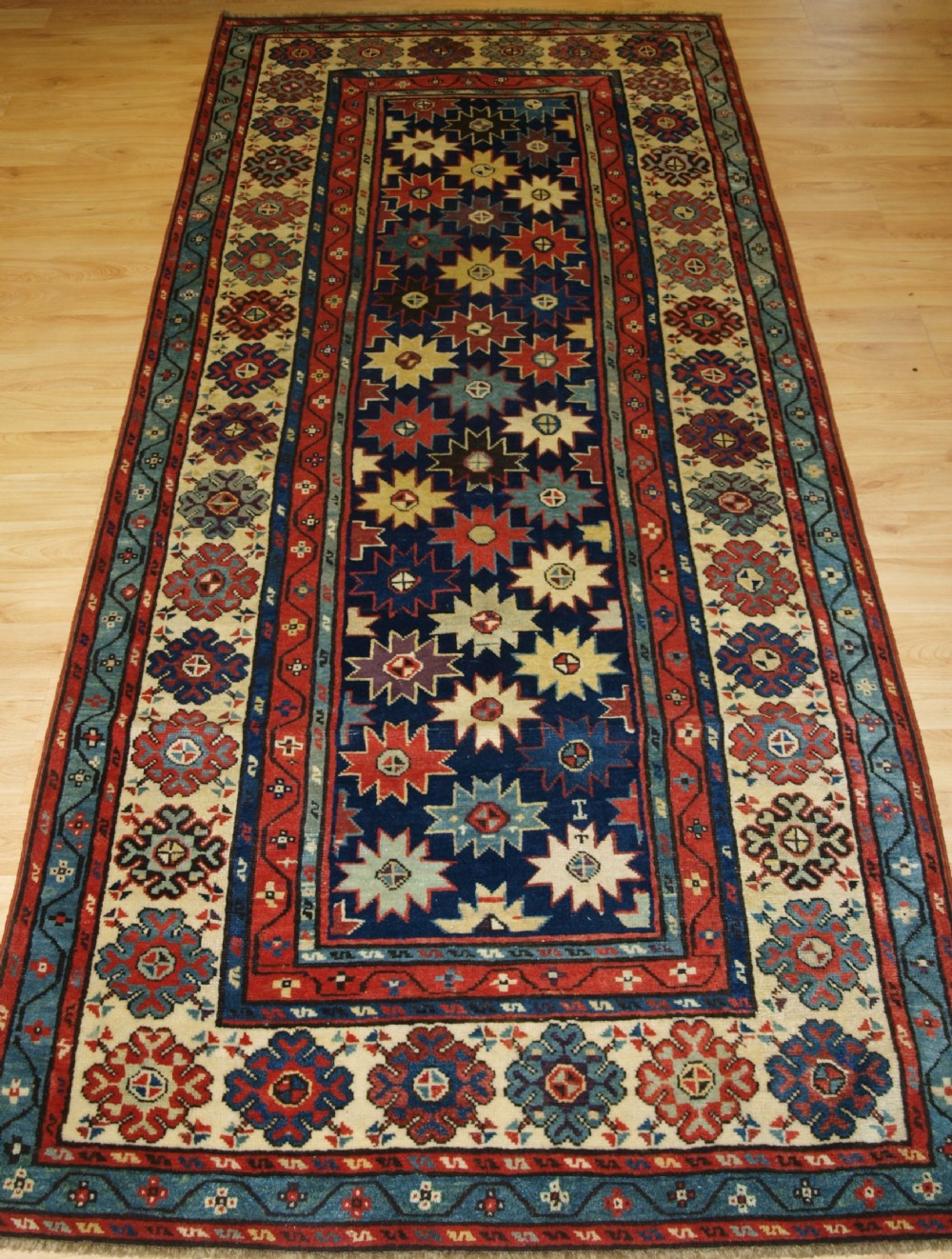 antique caucasian talish long rug with star design superb colours mid 19th century