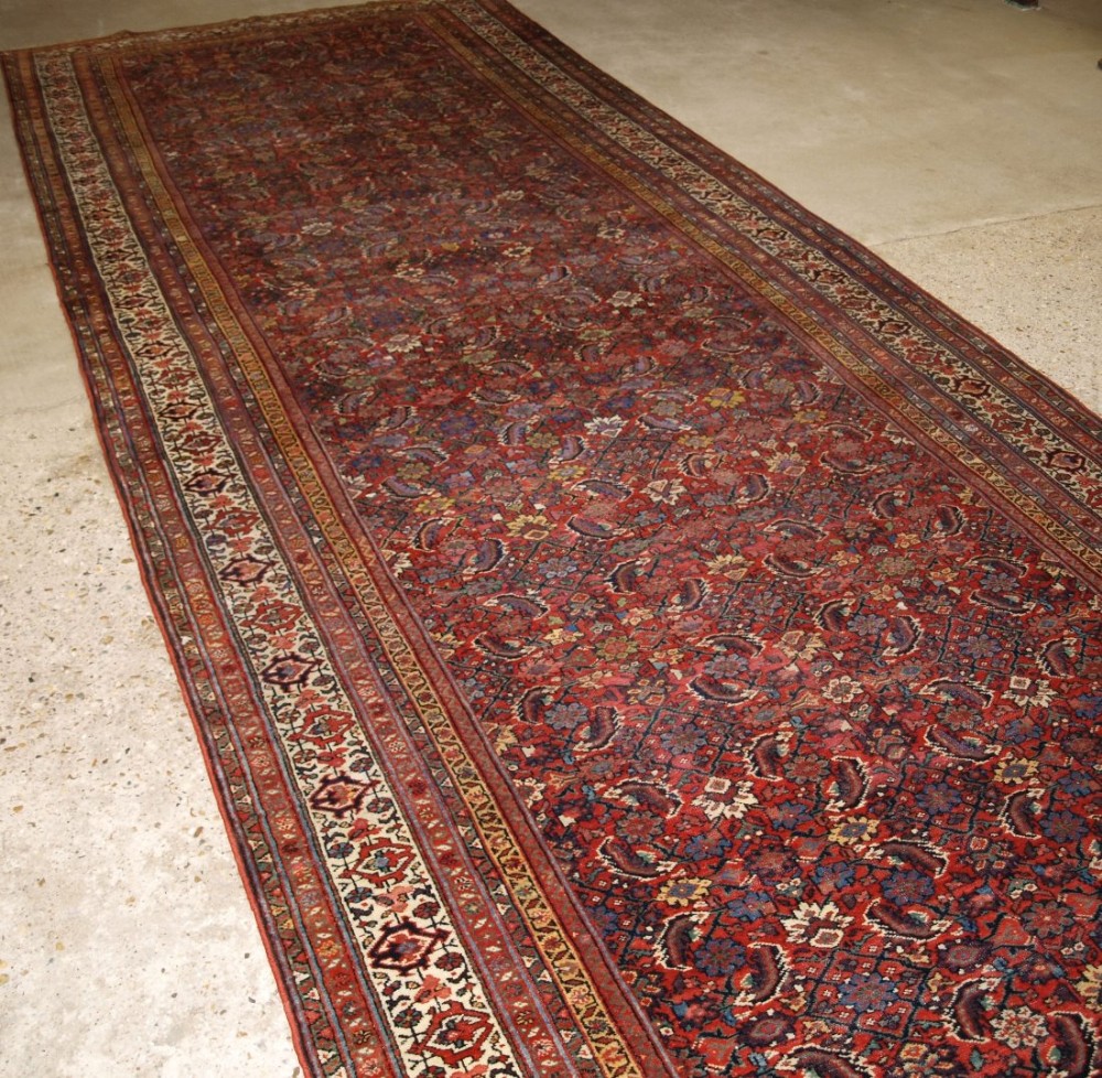 antique north persian faraghan kelleh corridor carpet of exceptionally large size and fine weave late 19th century