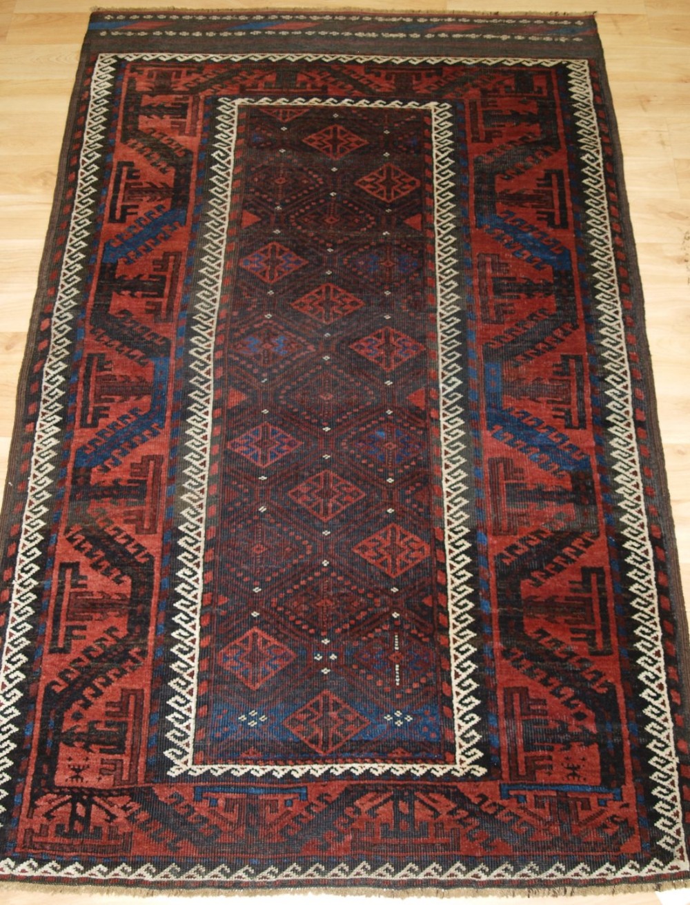 antique baluch rug lattice design large boat border superb colours circa 1870