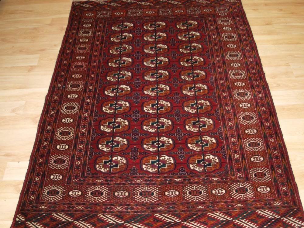 antique tekke turkmen 'dip khali' rug deep red colour great condition circa 190020