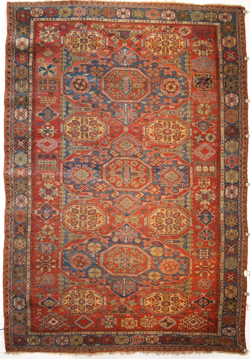 antique caucasian three medallion soumak carpet of rare design superb colour circa 1880