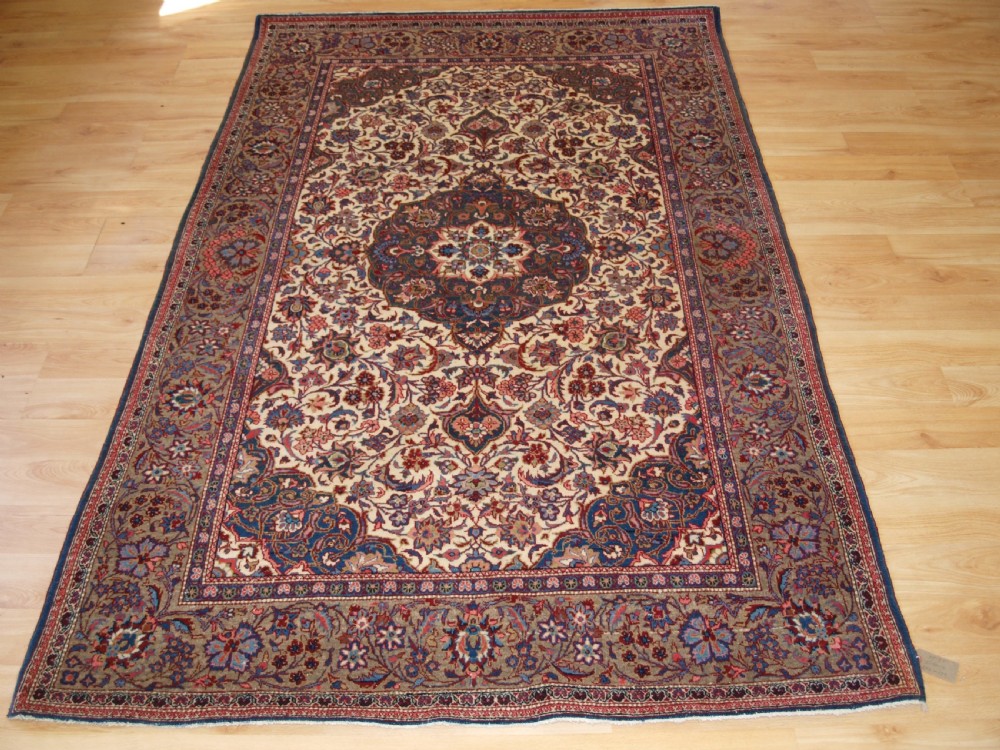 old tabriz rug of traditional floral medallion design circa 192030