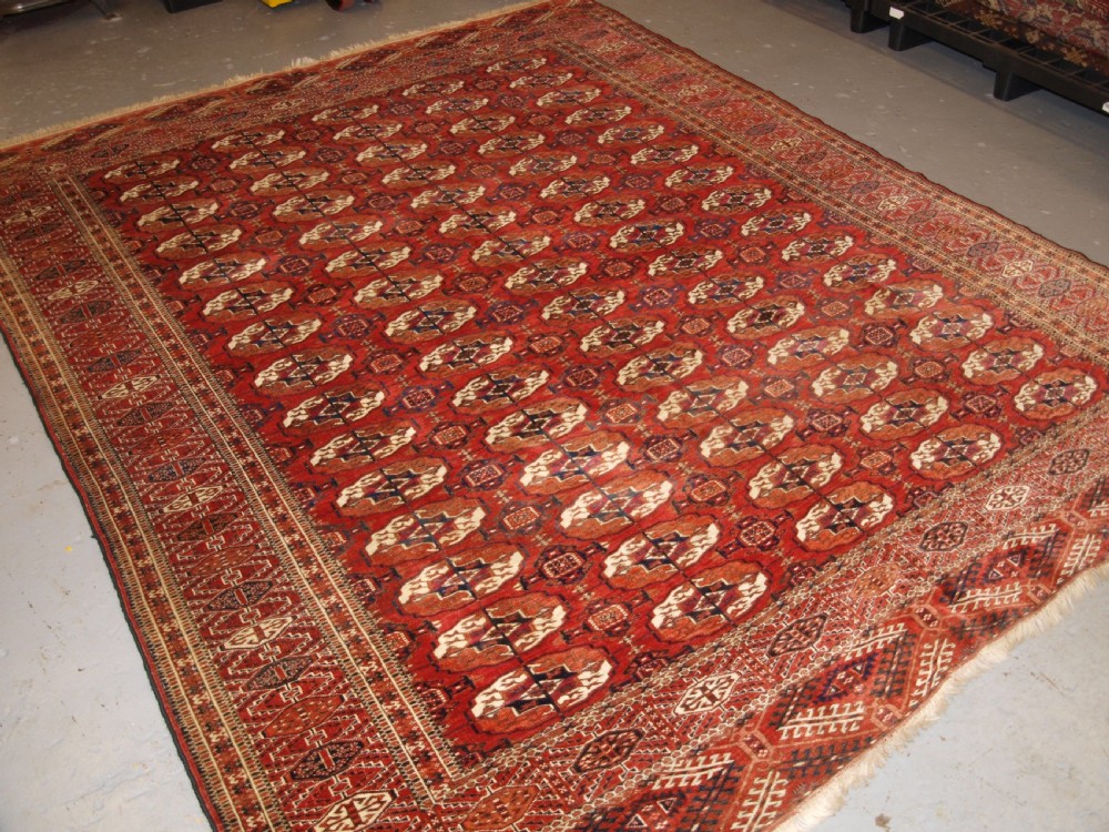 antique tekke turkmen main carpet square shape good colour late 19th century