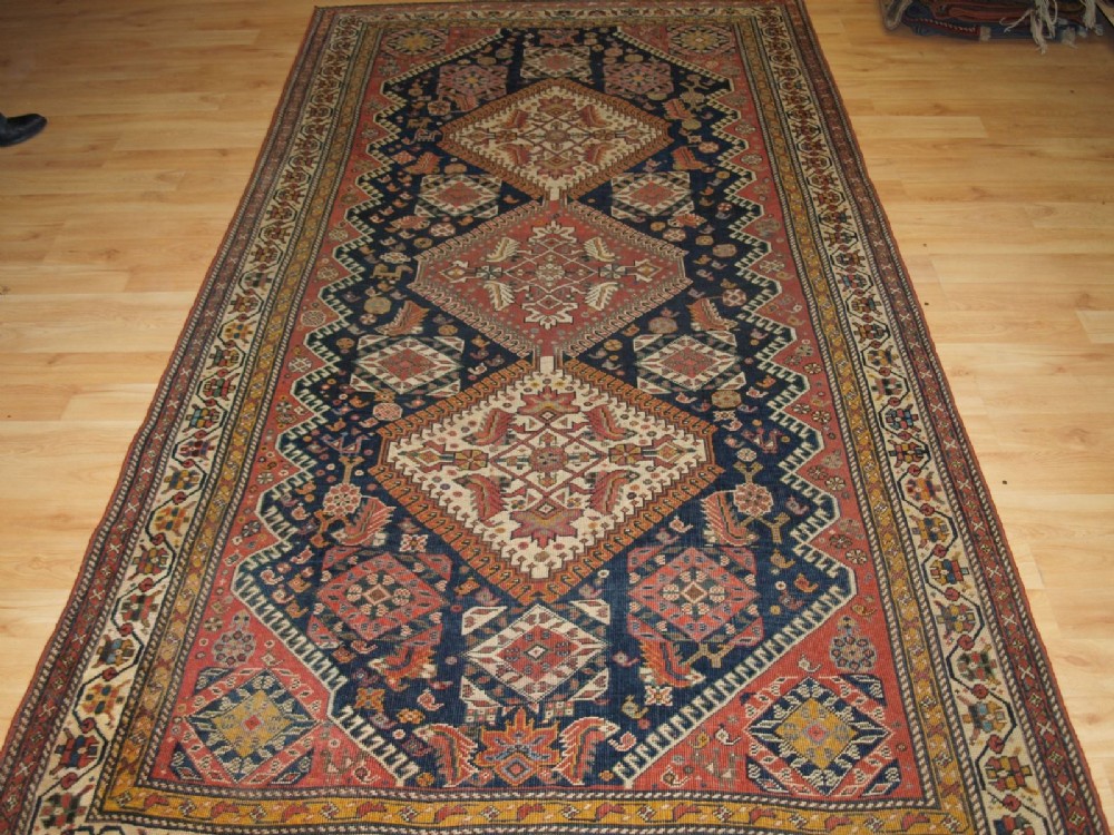 antique tribal qashqai rug triple medallion with large scale heratti design circa 1900