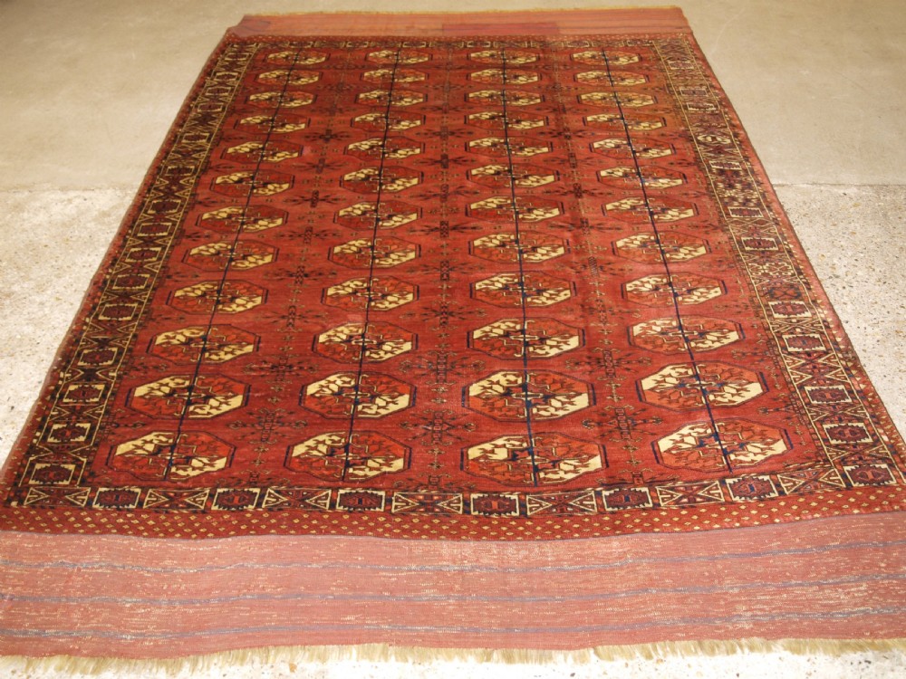 antique tekke turkmen main carpet with rare octagonal guls mid 19th century