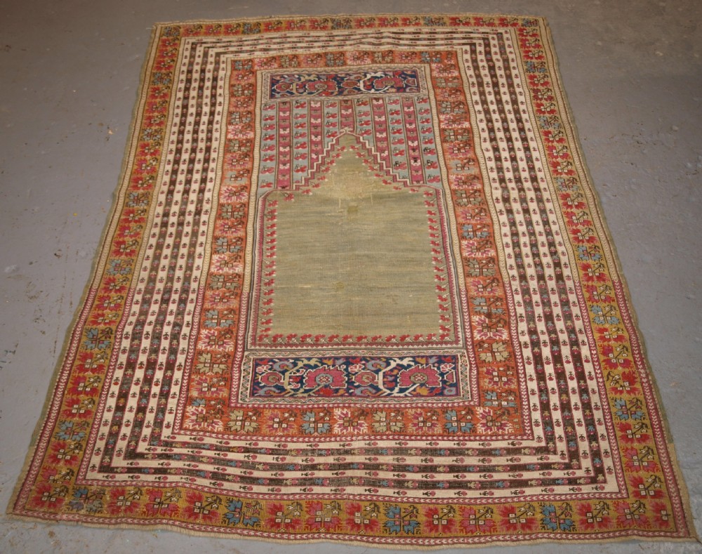 antique turkish ghiordes prayer rug multiple borders green field circa 1800