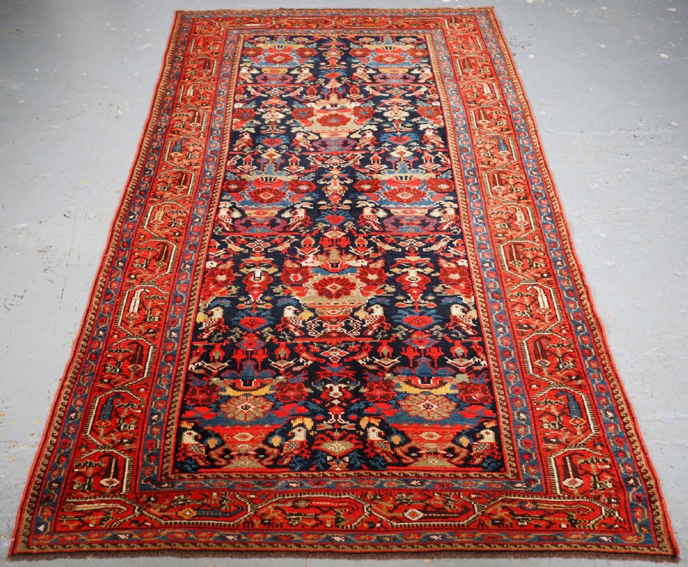 antique malayer village rug with vase and peacock design circa 1900