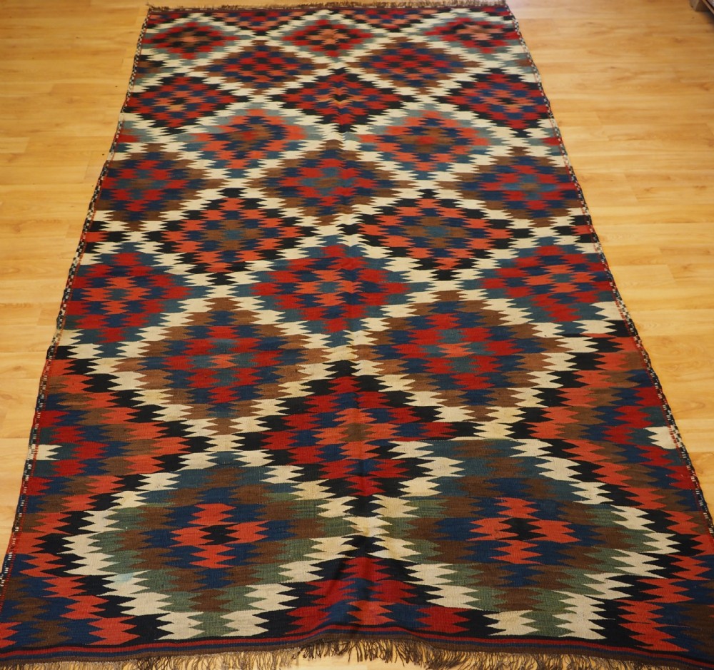 antique varamin region kilim with eye dazzler design circa 1900