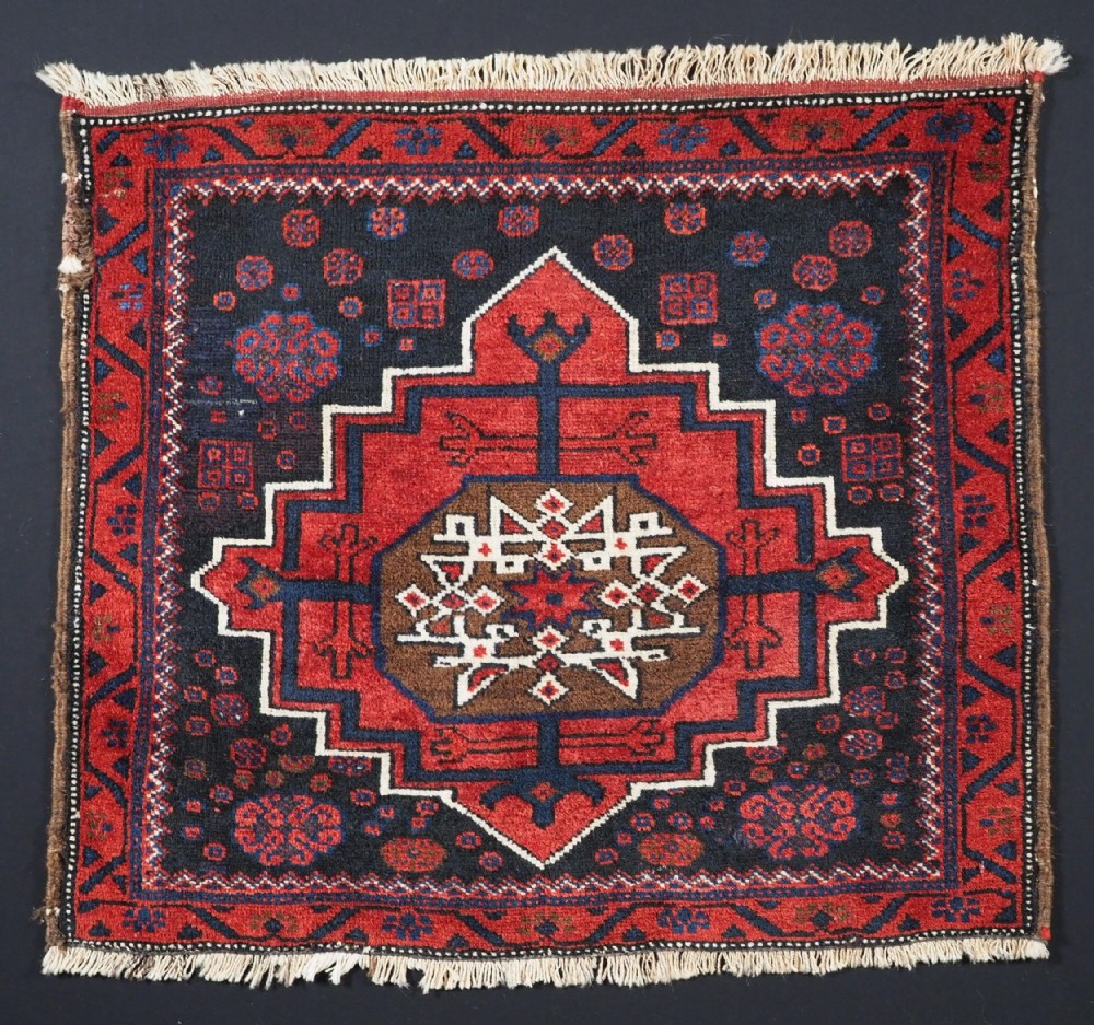antique baluch bag face with large medallion design circa 1920
