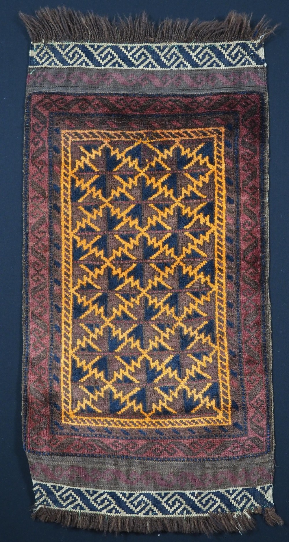 antique baluch pushti face with lotus leaf design circa 1900