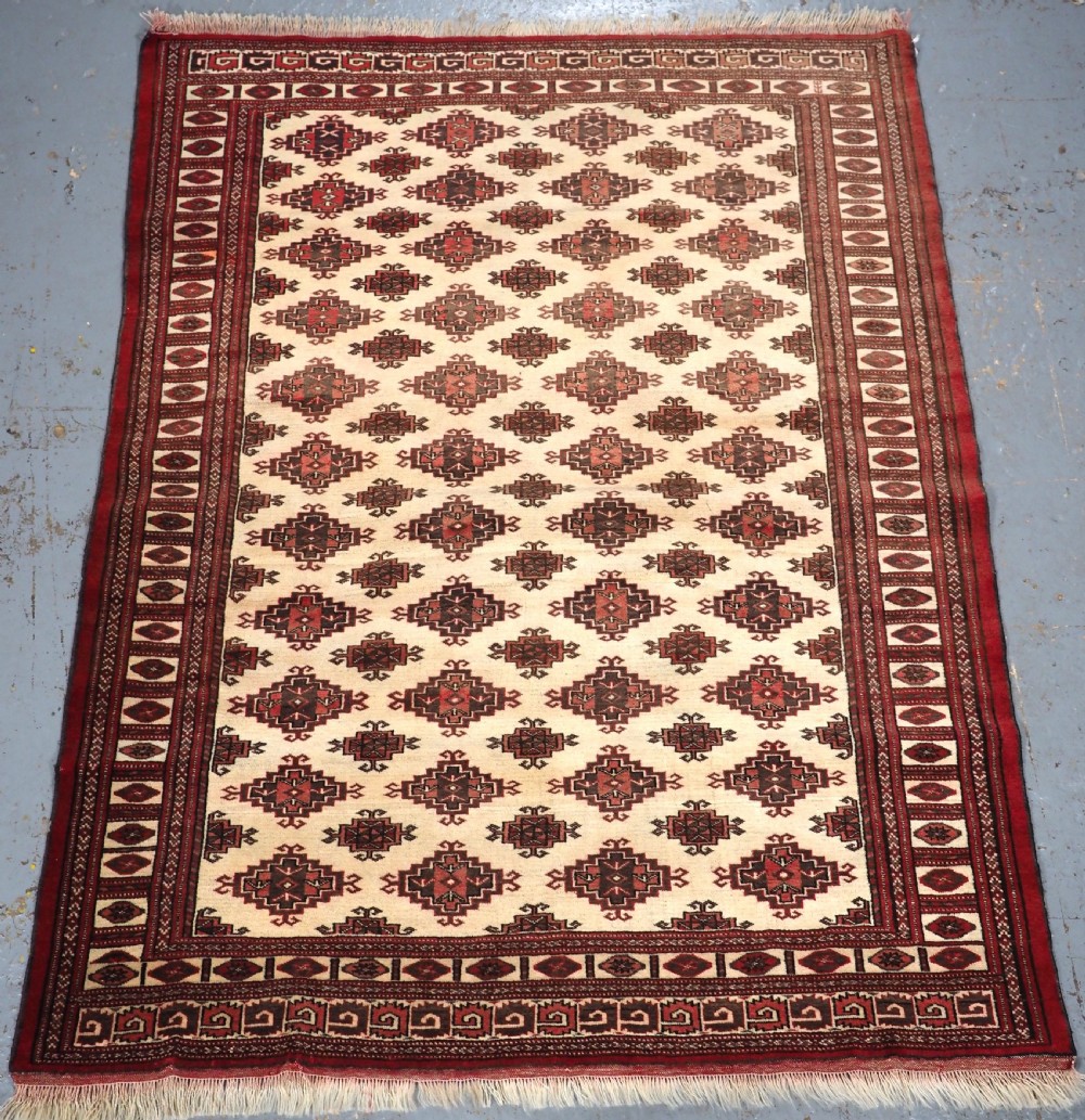 antique yomut turkmen rug on a scarce white field circa 1920