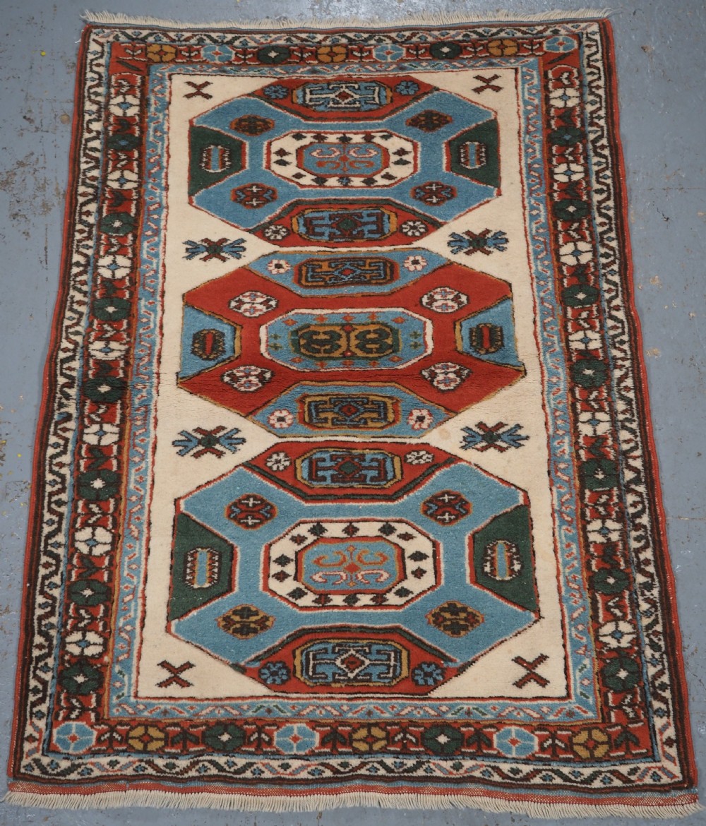 vintage turkish kazak rug of small size octagon design circa 1960