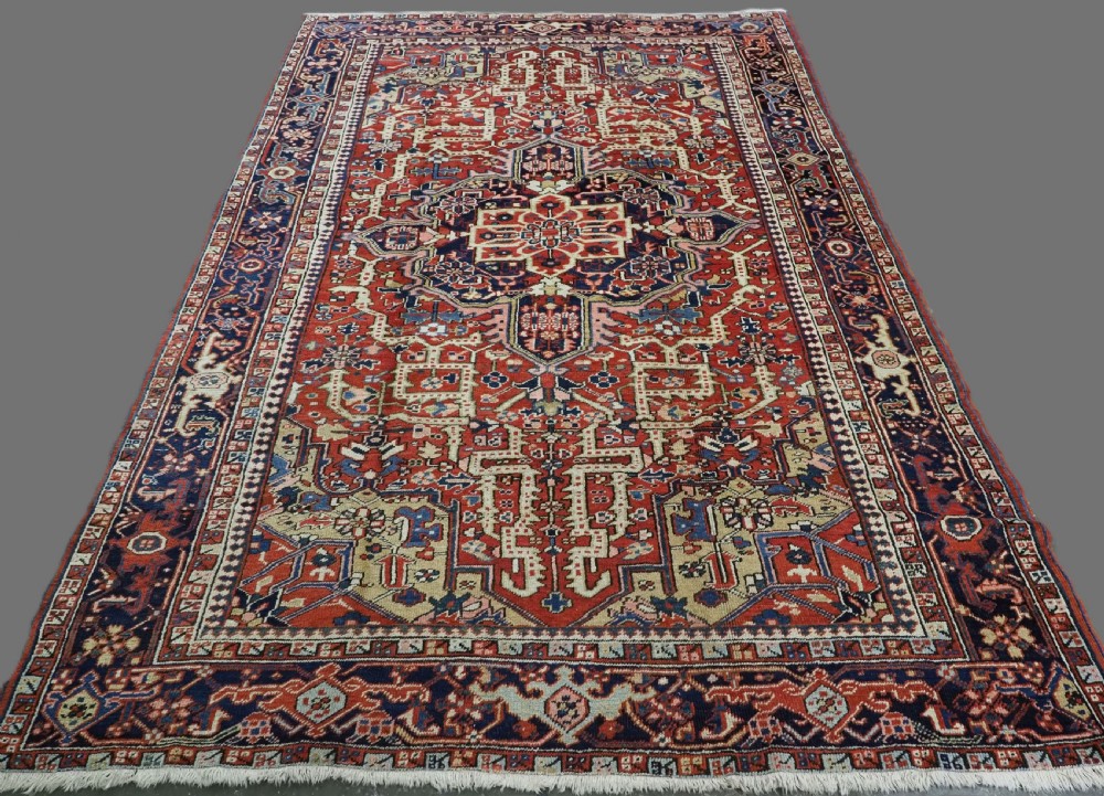 antique heriz carpet small medallion with scarce field design circa 1900