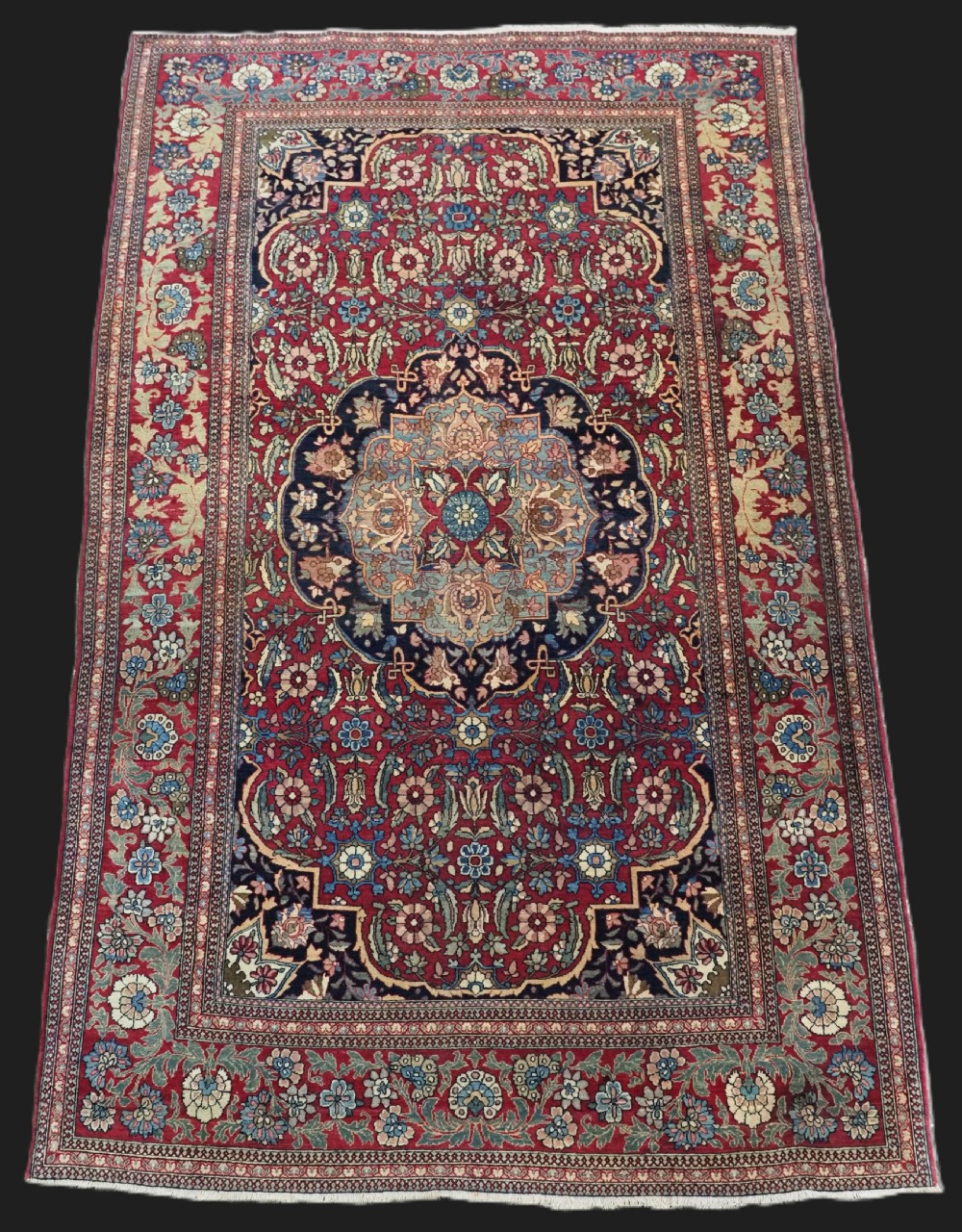antique isfahan rug of classic small medallion design circa 1900