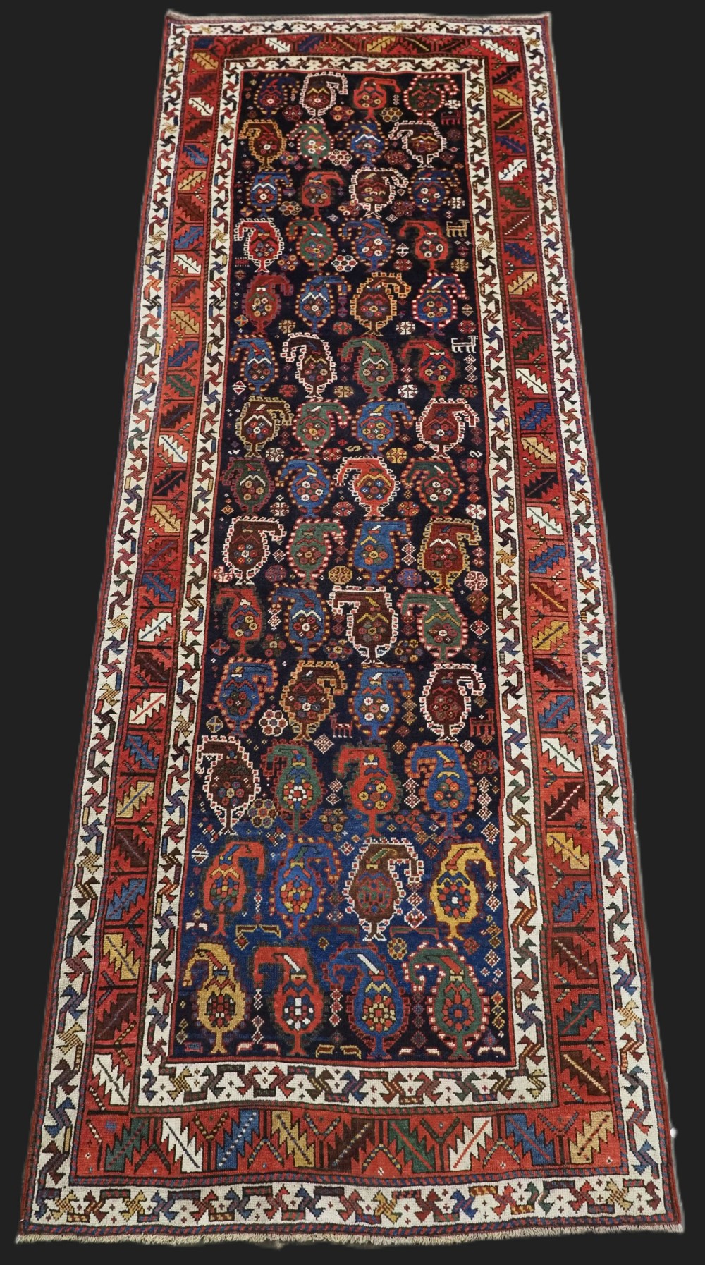 antique caucasian gendje kazak runner with colourful boteh design circa 1900