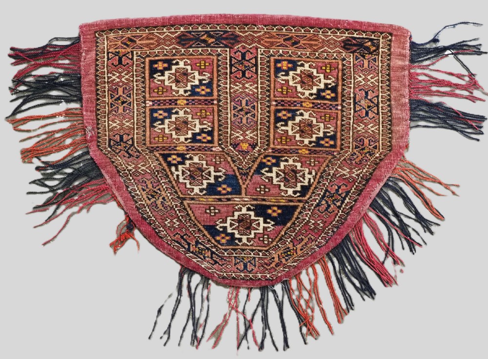 antique tekke turkmen saddle cover rug with original tassels circa 1900