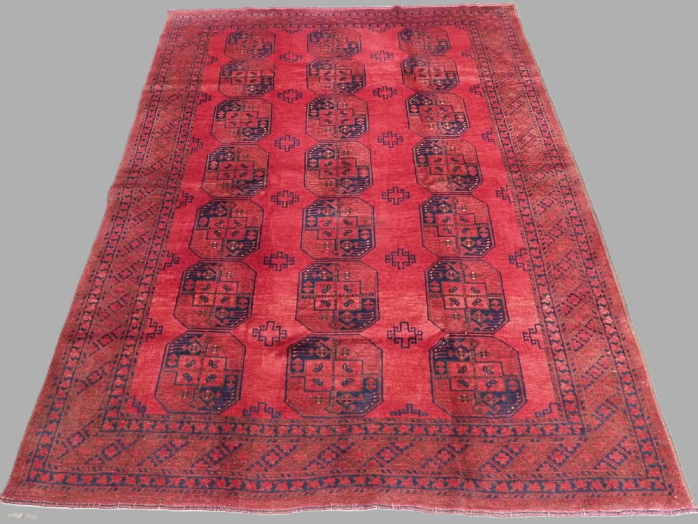 antique afghan village carpet with warm red colour circa 1920