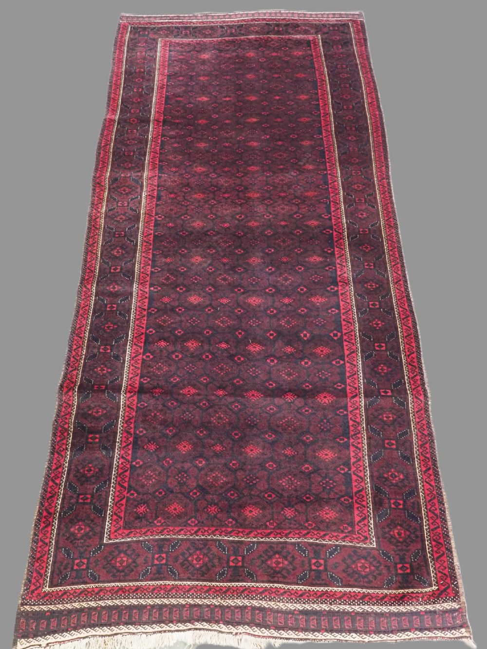 antique afghan baluch long rug runner of mushwani design circa 1930